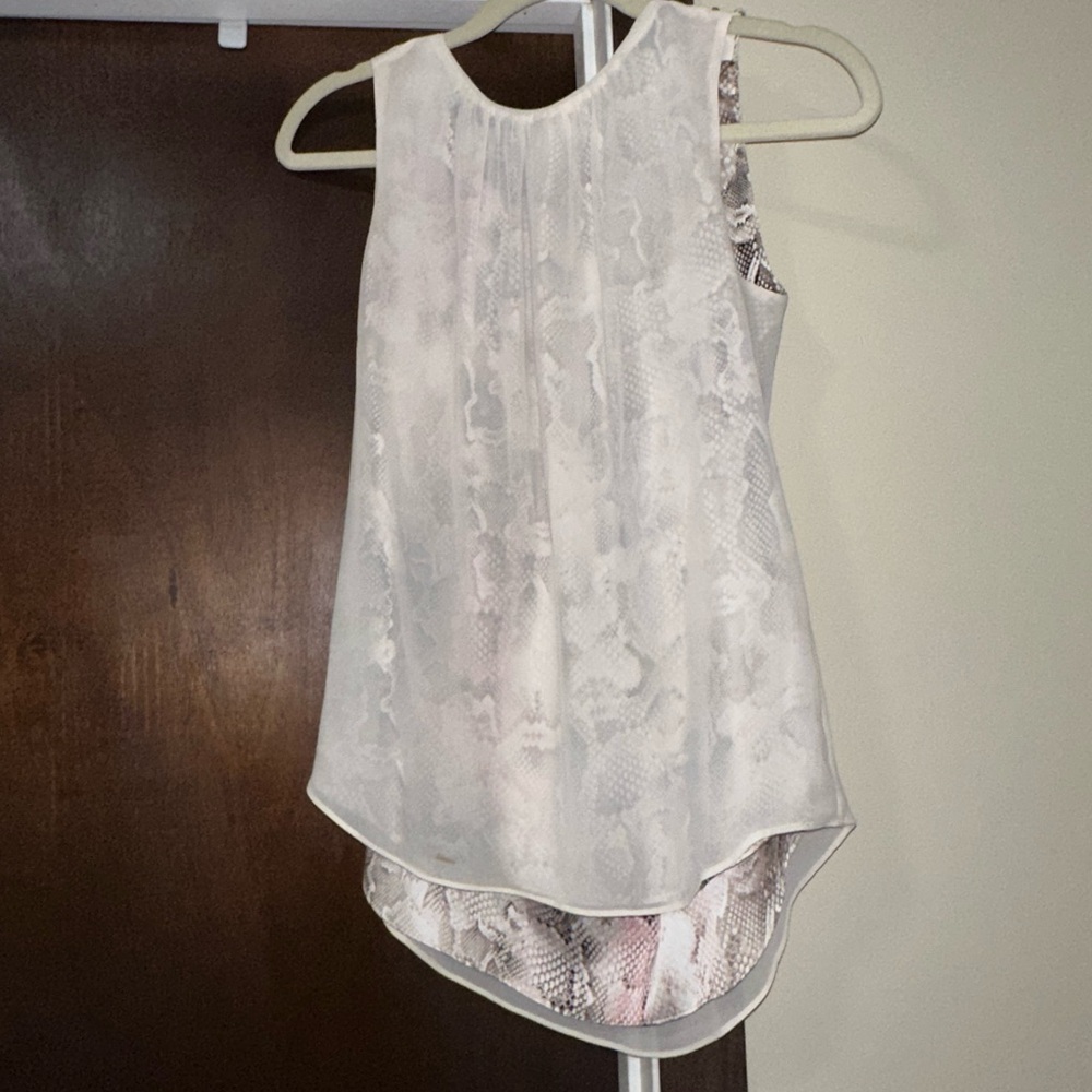 White House Black Market Size 0 Top. Sheer over animal print. MUST BE BUNDLED